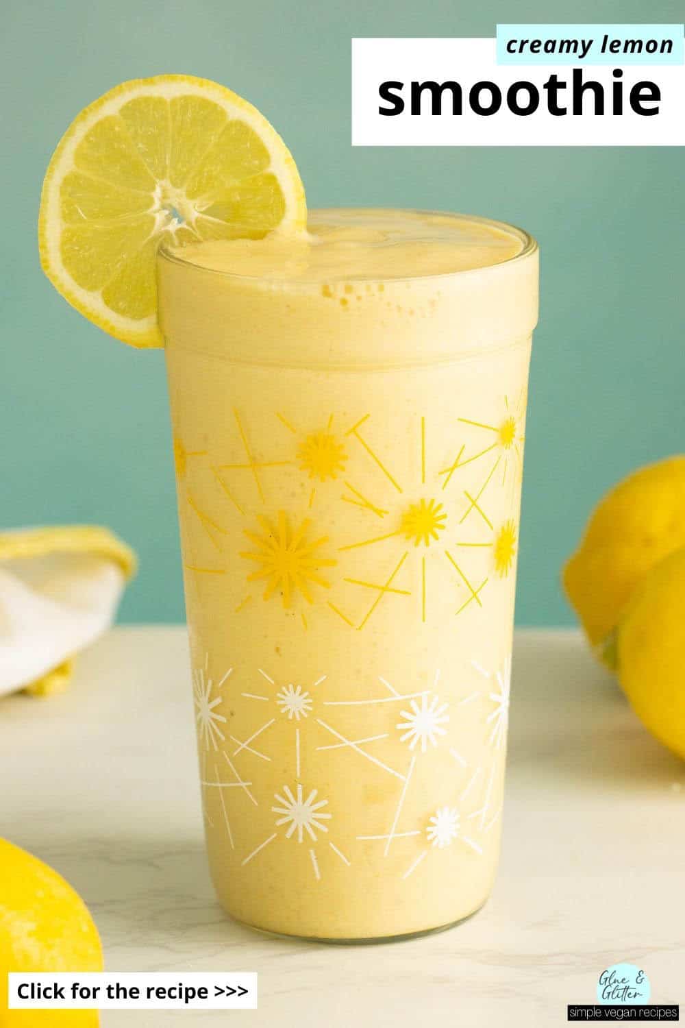 lemon smoothie in a glass with a lemon wheel, text overlay