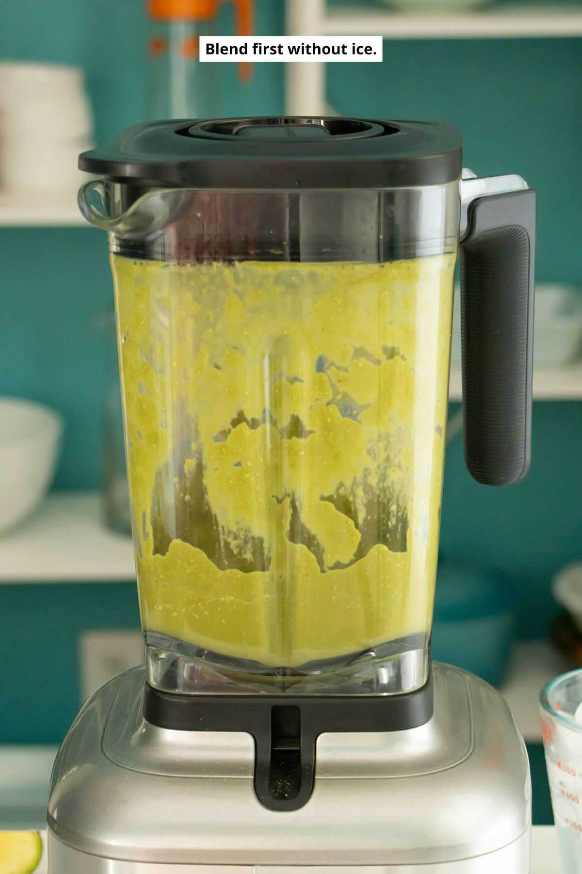 blender with the oat milk, oats, matcha, avocado, and agave after the first blending