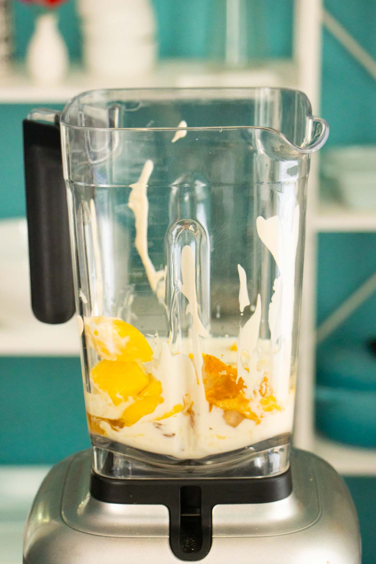 lemon smoothie ingredients in the blender before blending