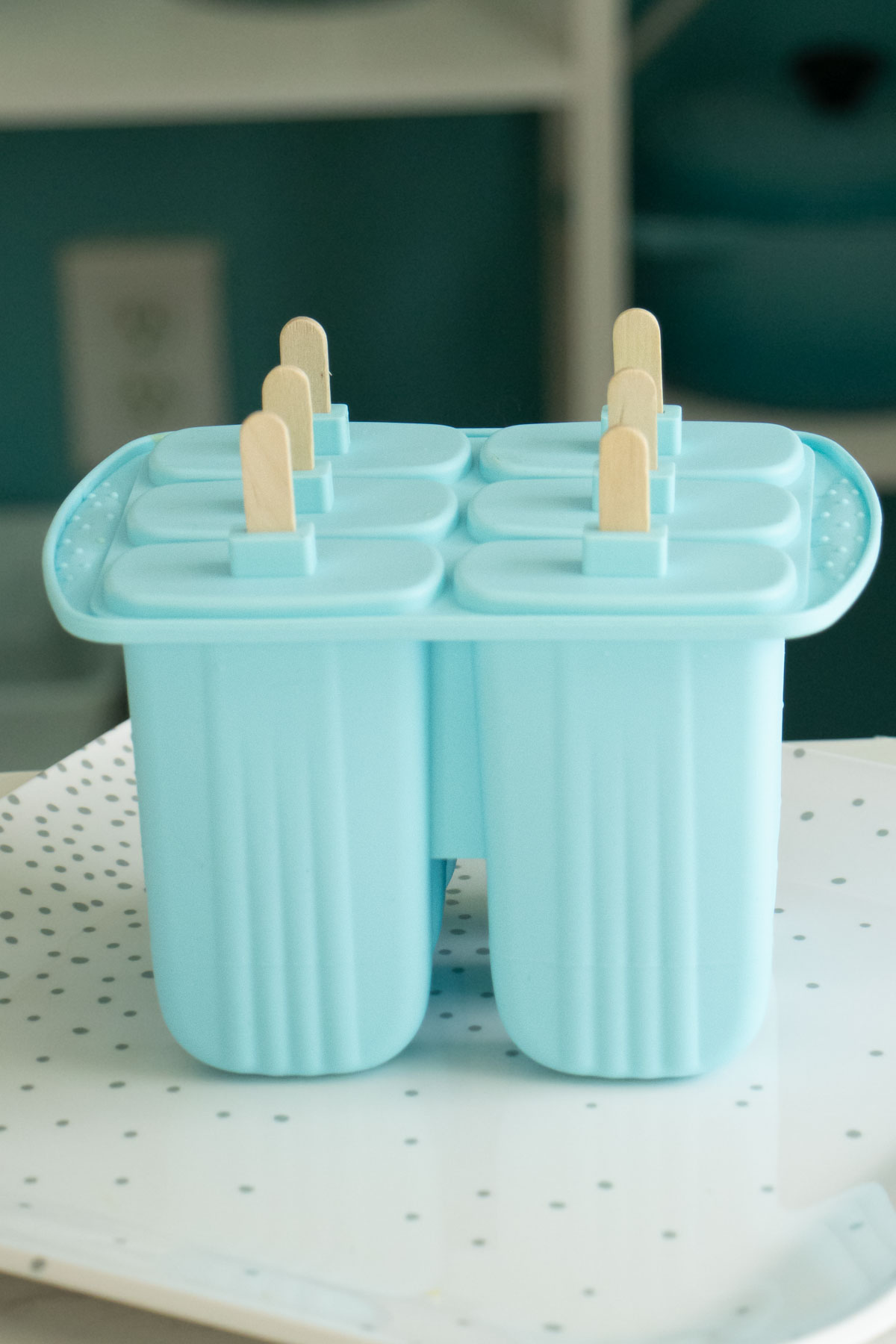 full popsicle molds after freezing
