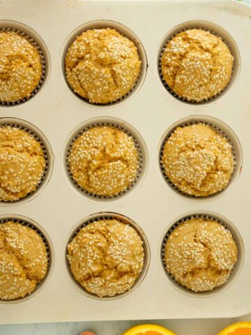 close-up of vegan orange muffins in the baking pan after baking