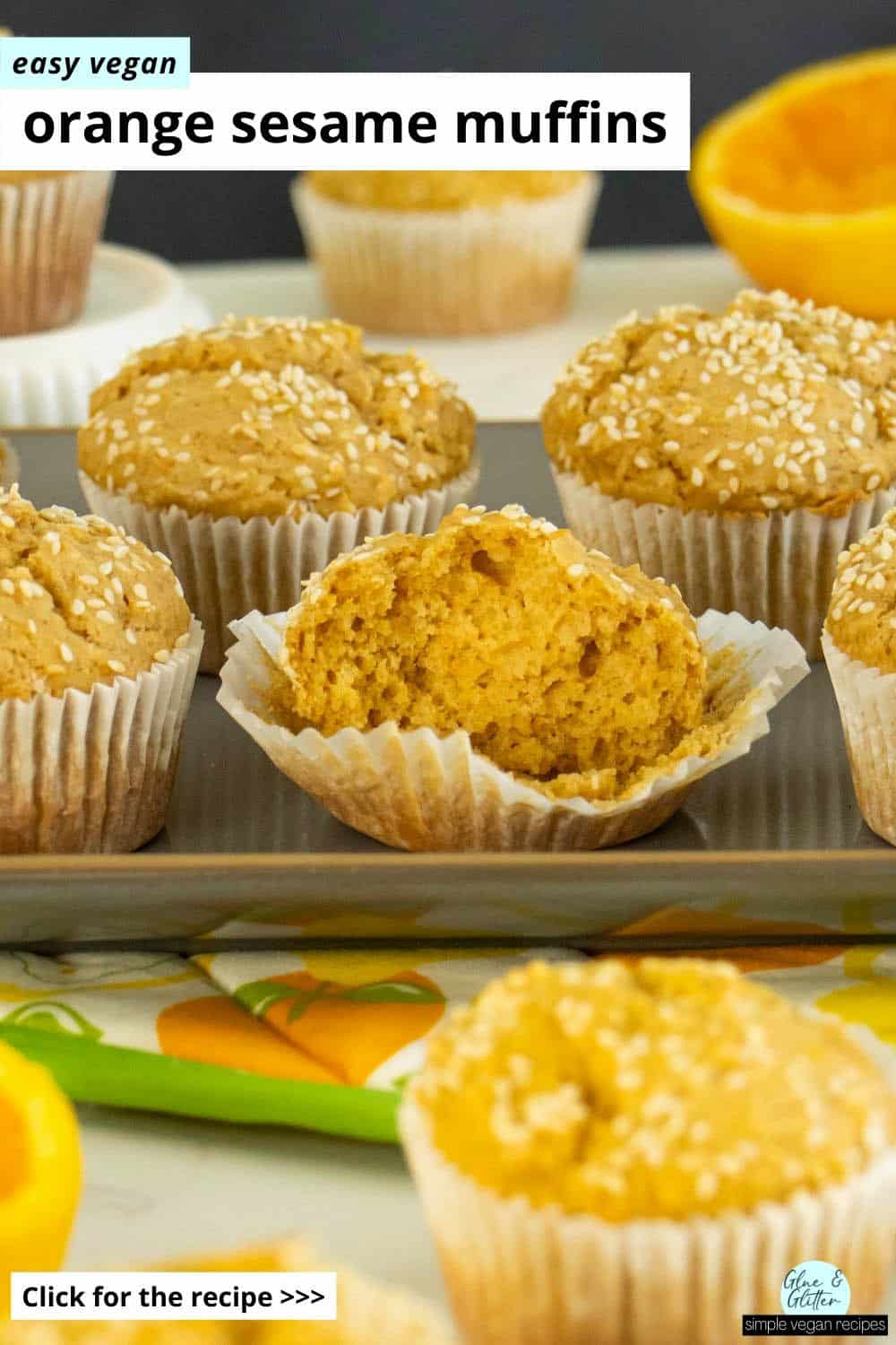 orange sesame muffins on a serving tray with oranges, one muffin torn in half, so you can see the texture inside, text overlay