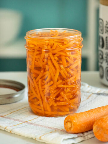 quick pickled carrots in a mason jar