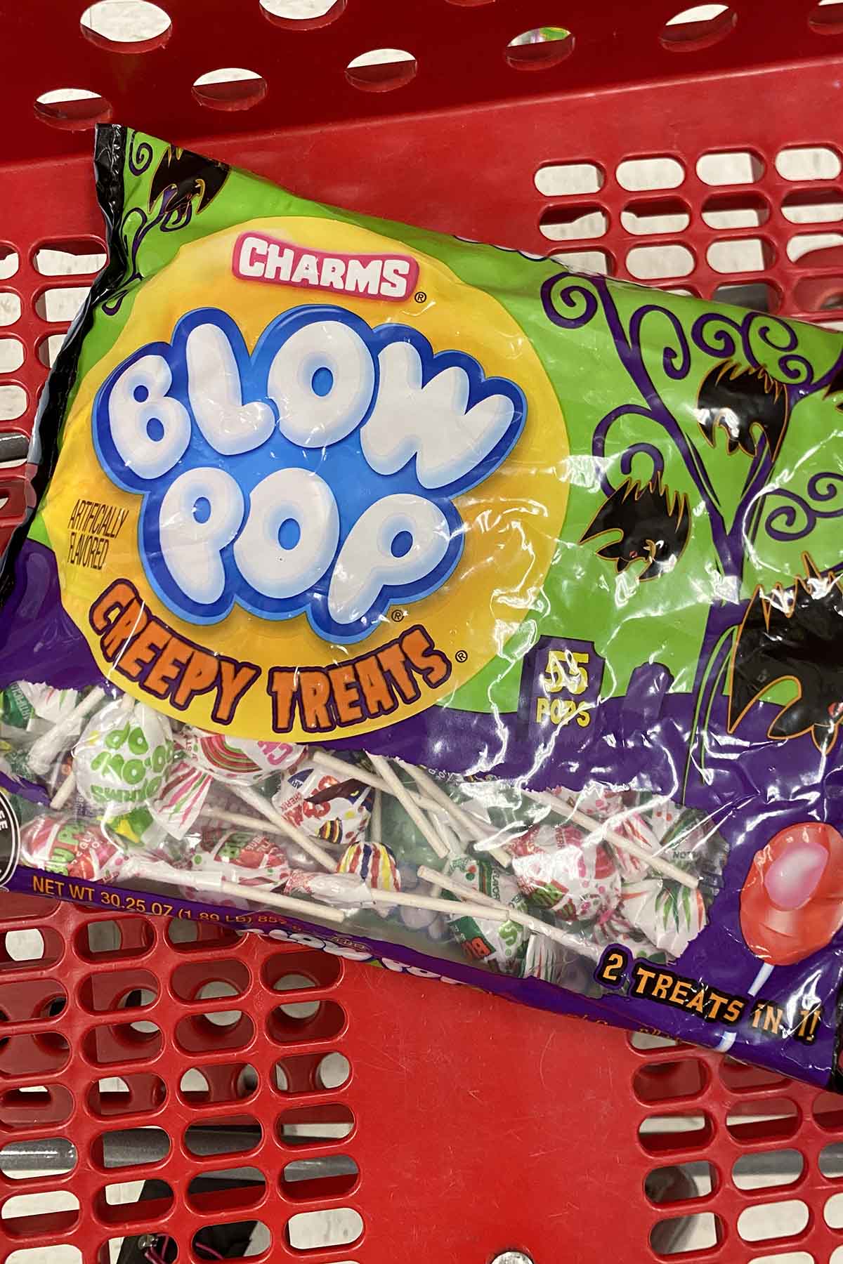 bag of Blow Pops in a shopping cart