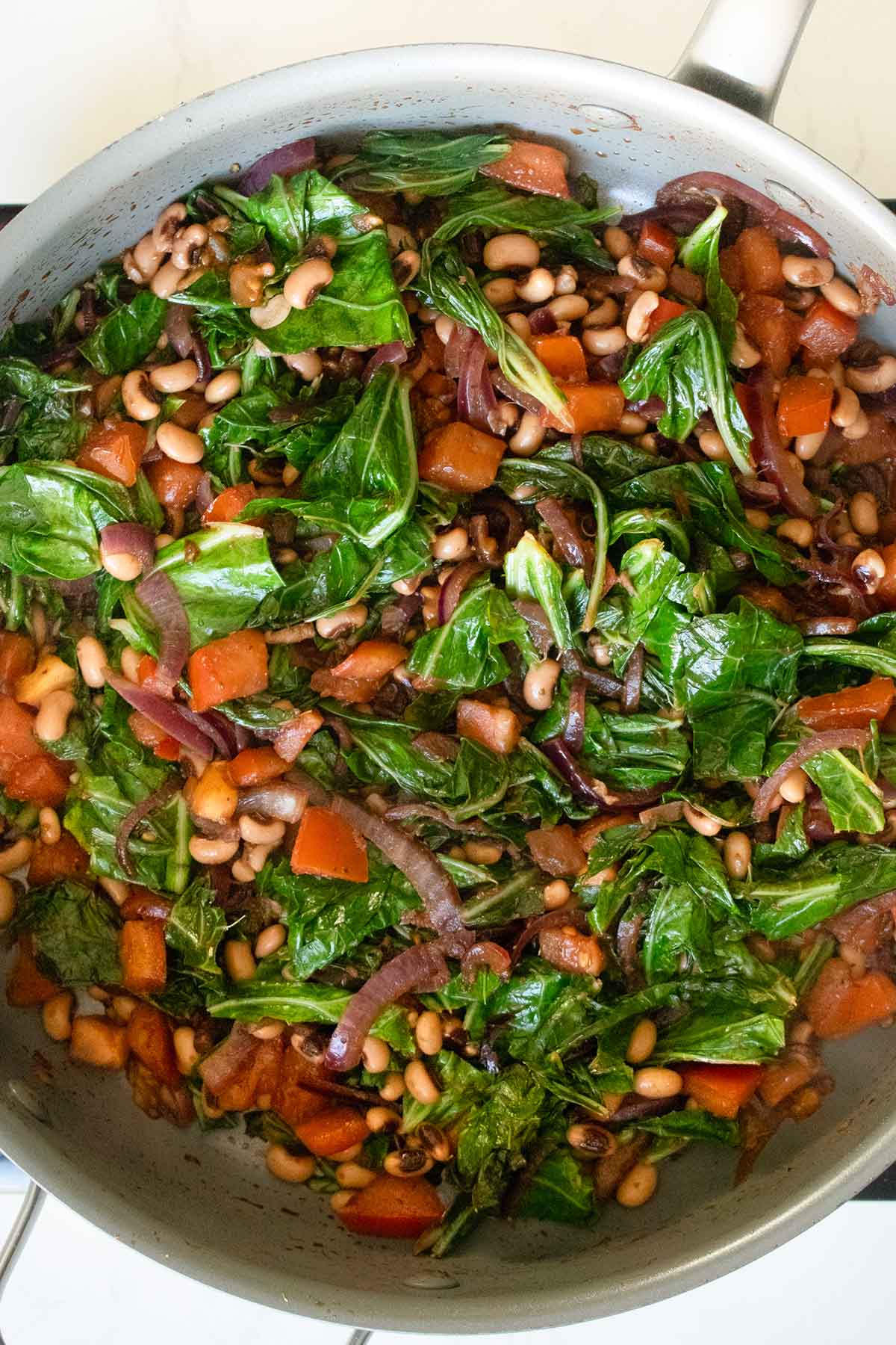vegan black eyed peas and collards in the pan after cooking