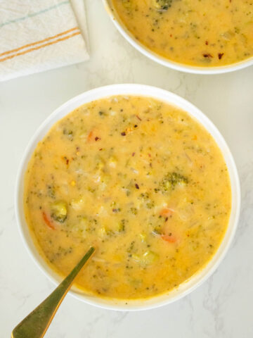 bowls of instant pot vegan broccoli cheddar soup