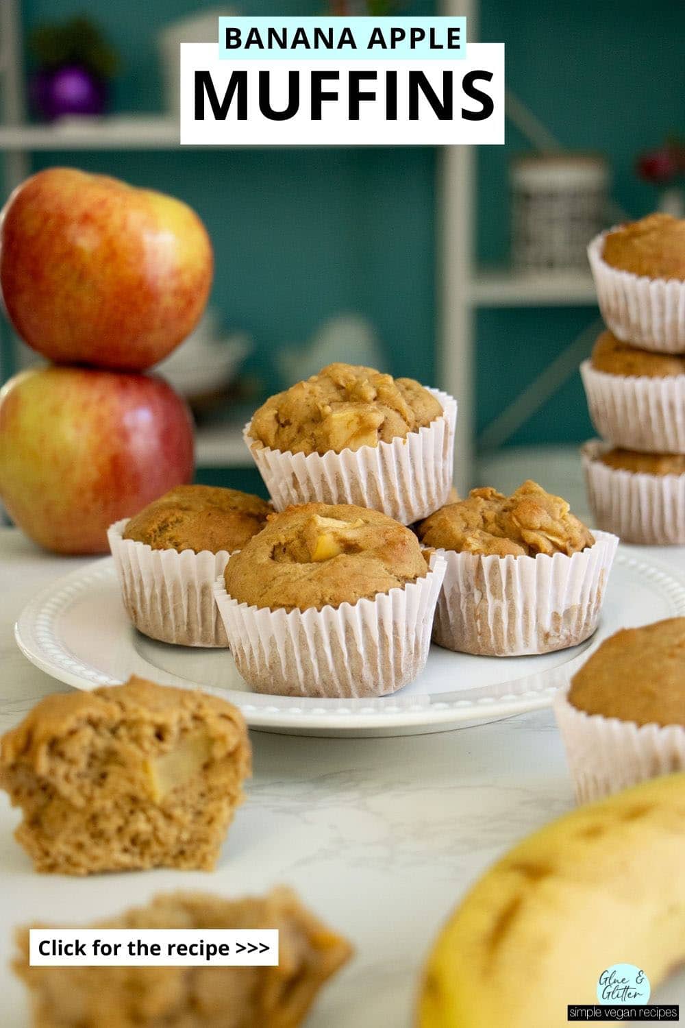 banana apple muffins on a white plate surrounded by apples, banana, and a muffin broken in half, so you can see the texture inside, text overlay