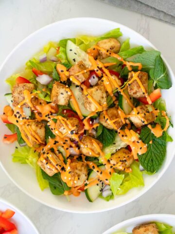 close-up of the gochujang salad topped with sesame seeds