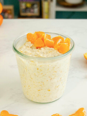 creamsicle overnight oats with chopped orange slices on top