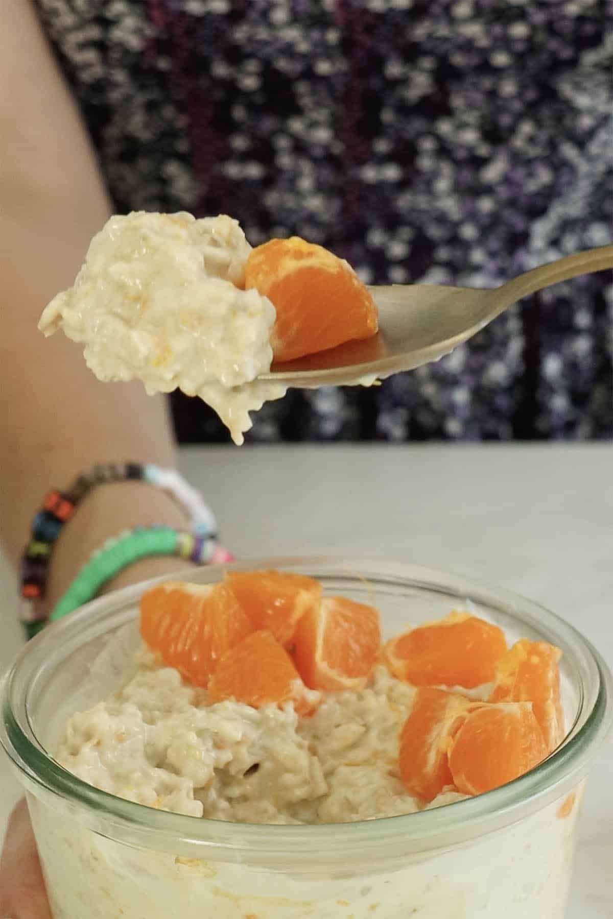 spoon scooping up a bite of creamsicle oats