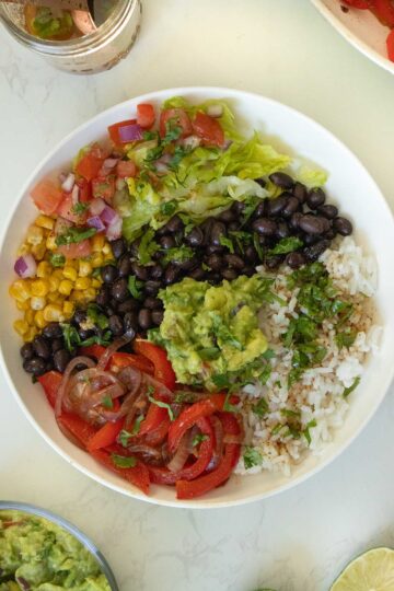 chipotle lime burrito bowl after adding the sauce