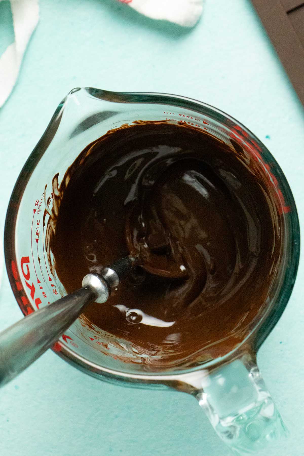 melted chocolate in the measuring bowl