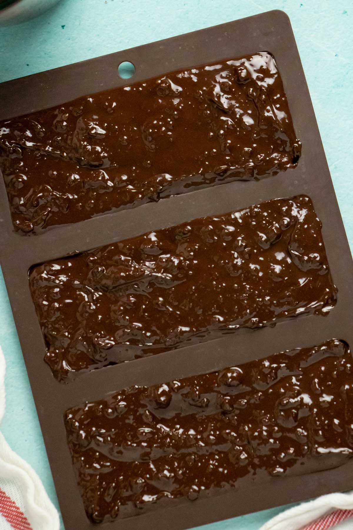 filled chocolate molds ready to chill