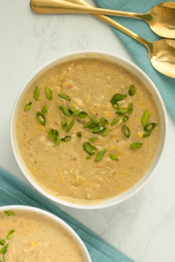 overhead photo of bowls of vegan instant pot corn chowder