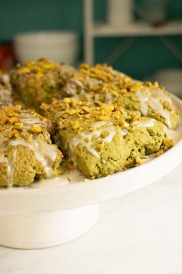 close-up of pistachio scones on a serving platter