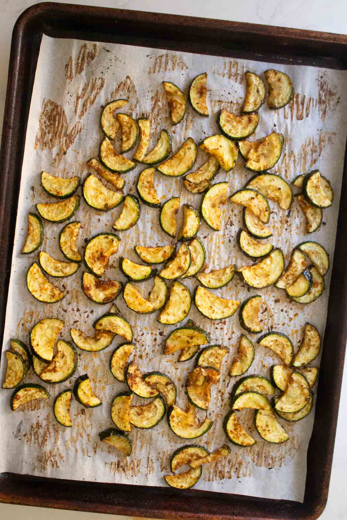 zucchini on the baking sheet after baking