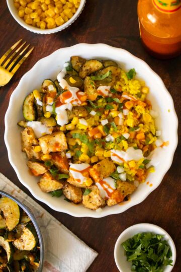 Mexican-inspired crispy tofu bowl with all of the toppings