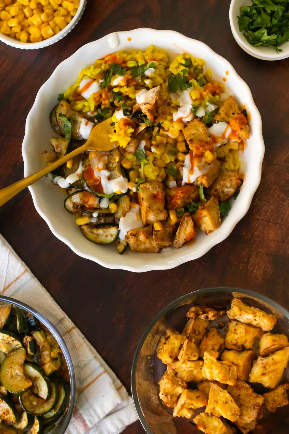 Mexican-inspired crispy tofu bowl with a bite on a fork