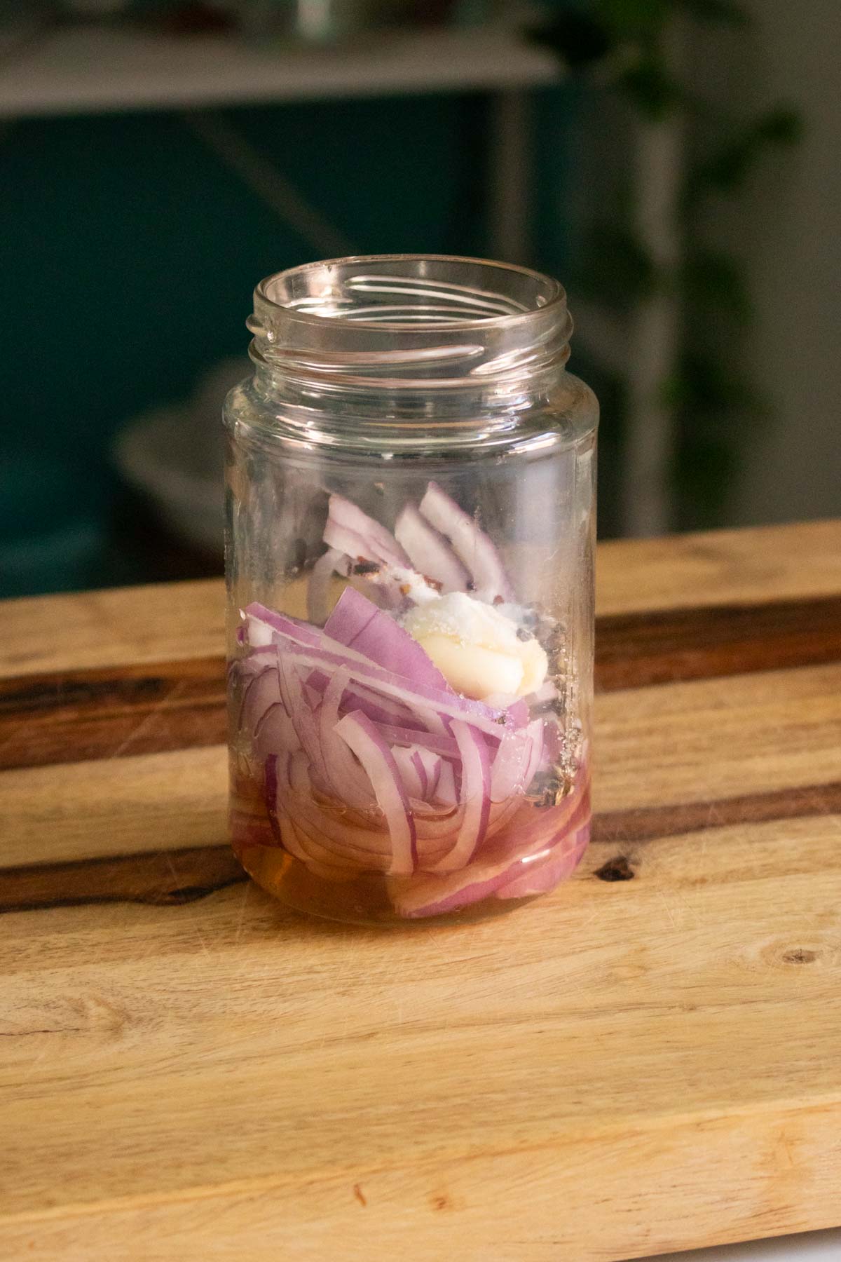 pickled onion ingredients in the jar before adding hot water