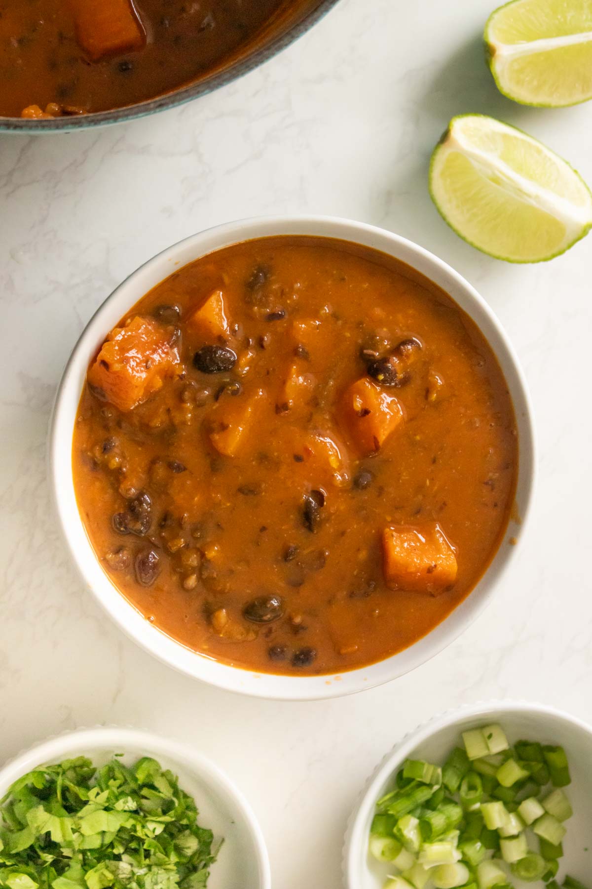 bowl of black bean sweet potato soup before adding toppings