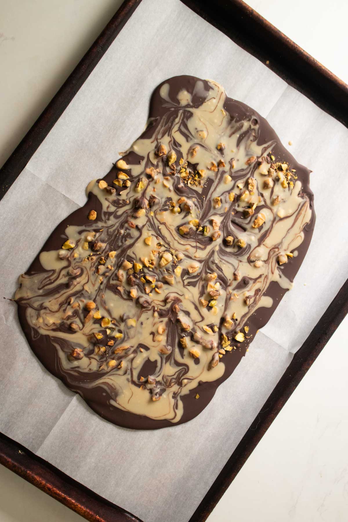 chilled chocolate pistachio bark before breaking it up