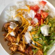 close-up of vegan fajita bowl on a white table