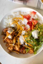 close-up of vegan fajita bowl on a white table