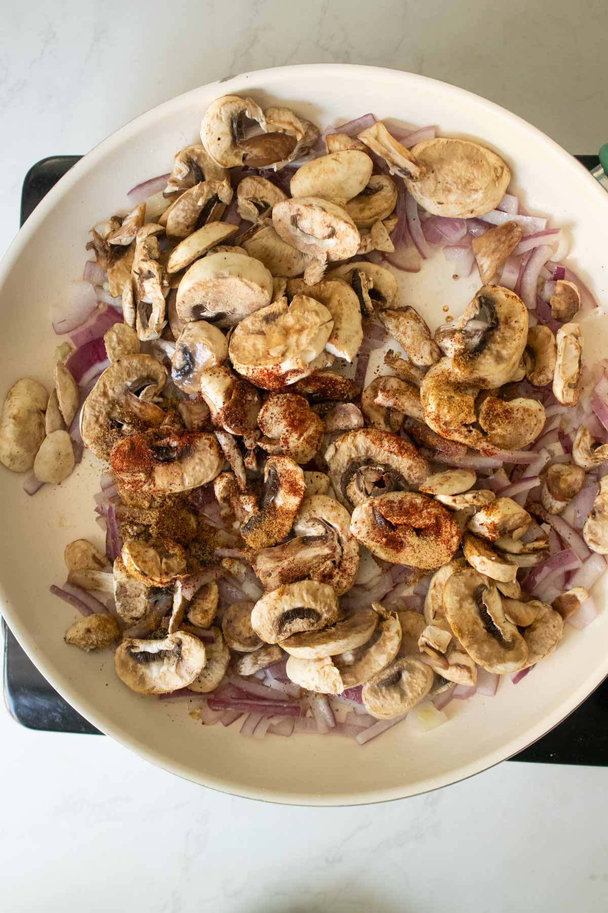 mushrooms in the pan before cooking