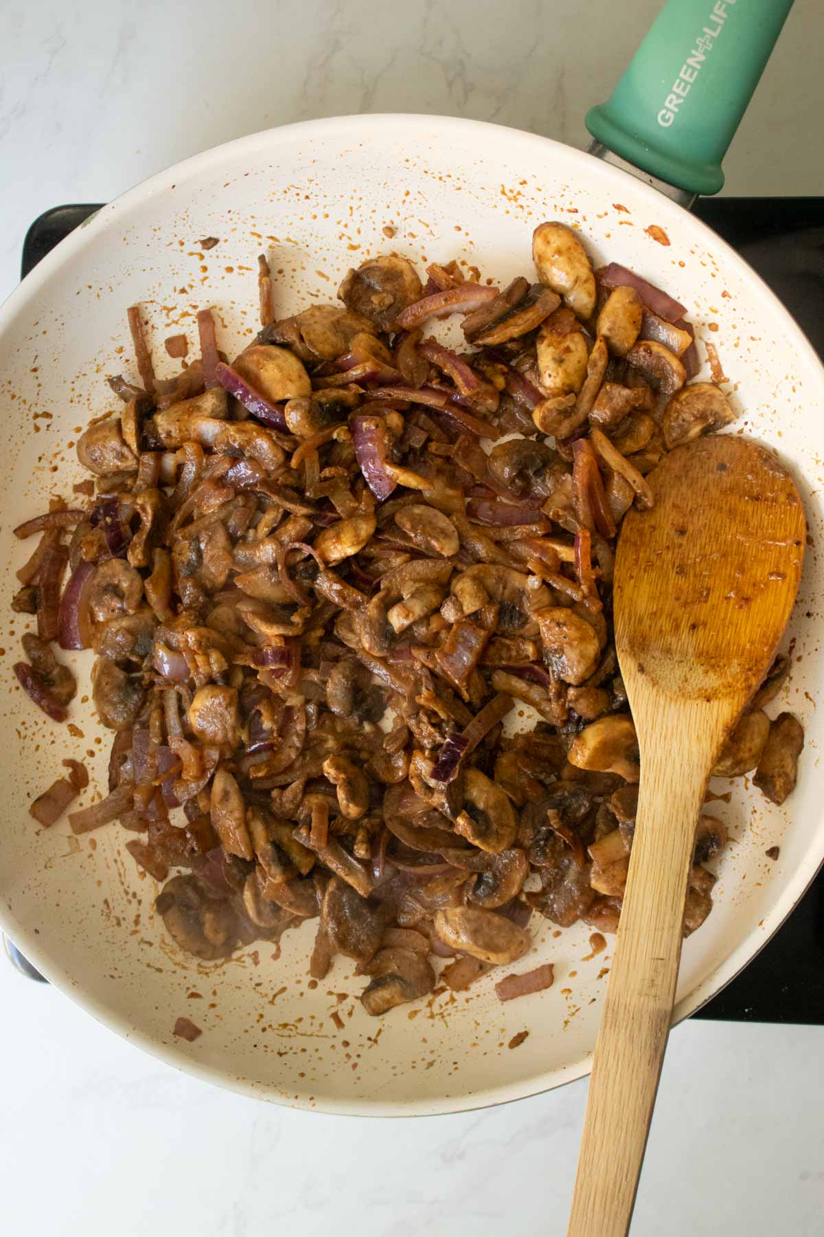 mushrooms in the pan before cooking