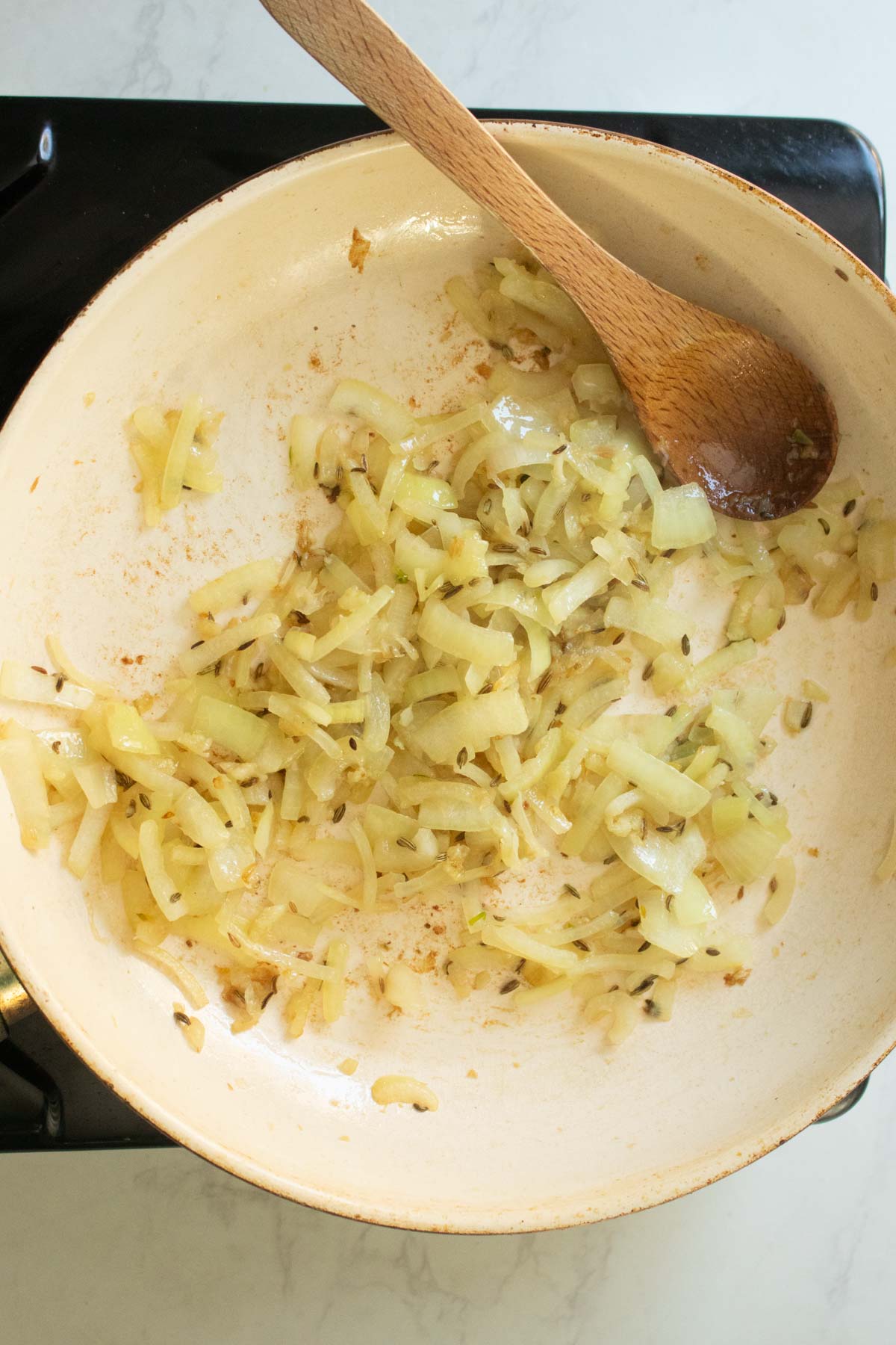 onion and garlic in the pan after cooking