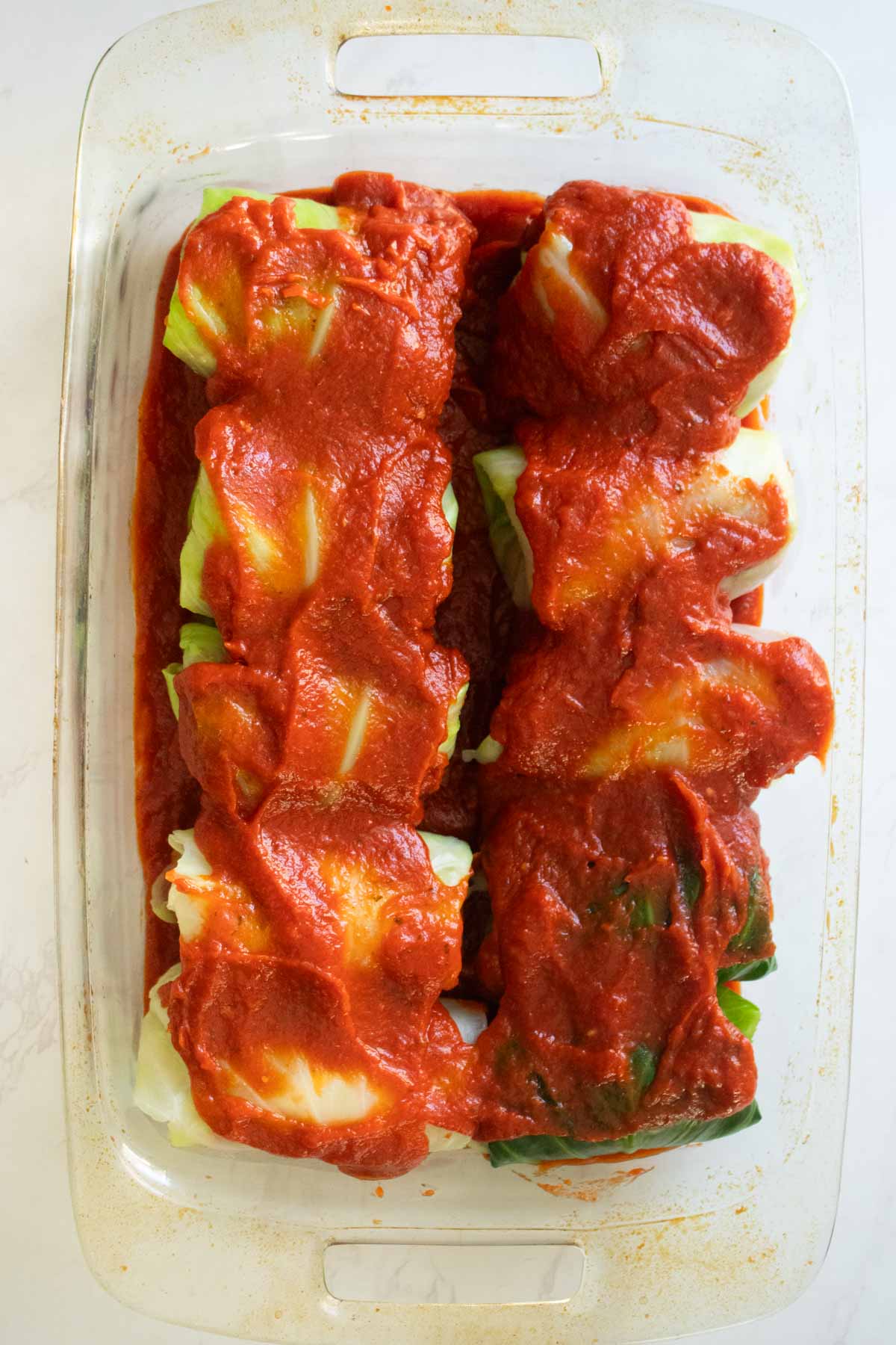 vegan rolled cabbage in the pan before baking