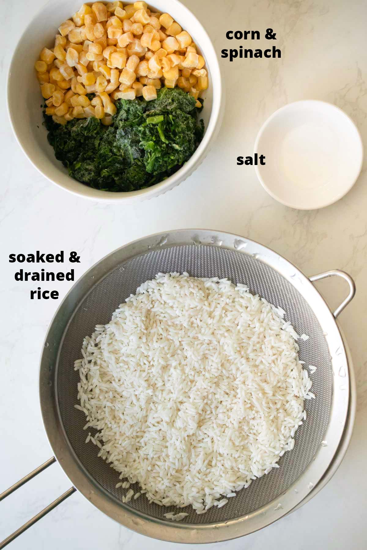 rice ingredients in bowls on a white table