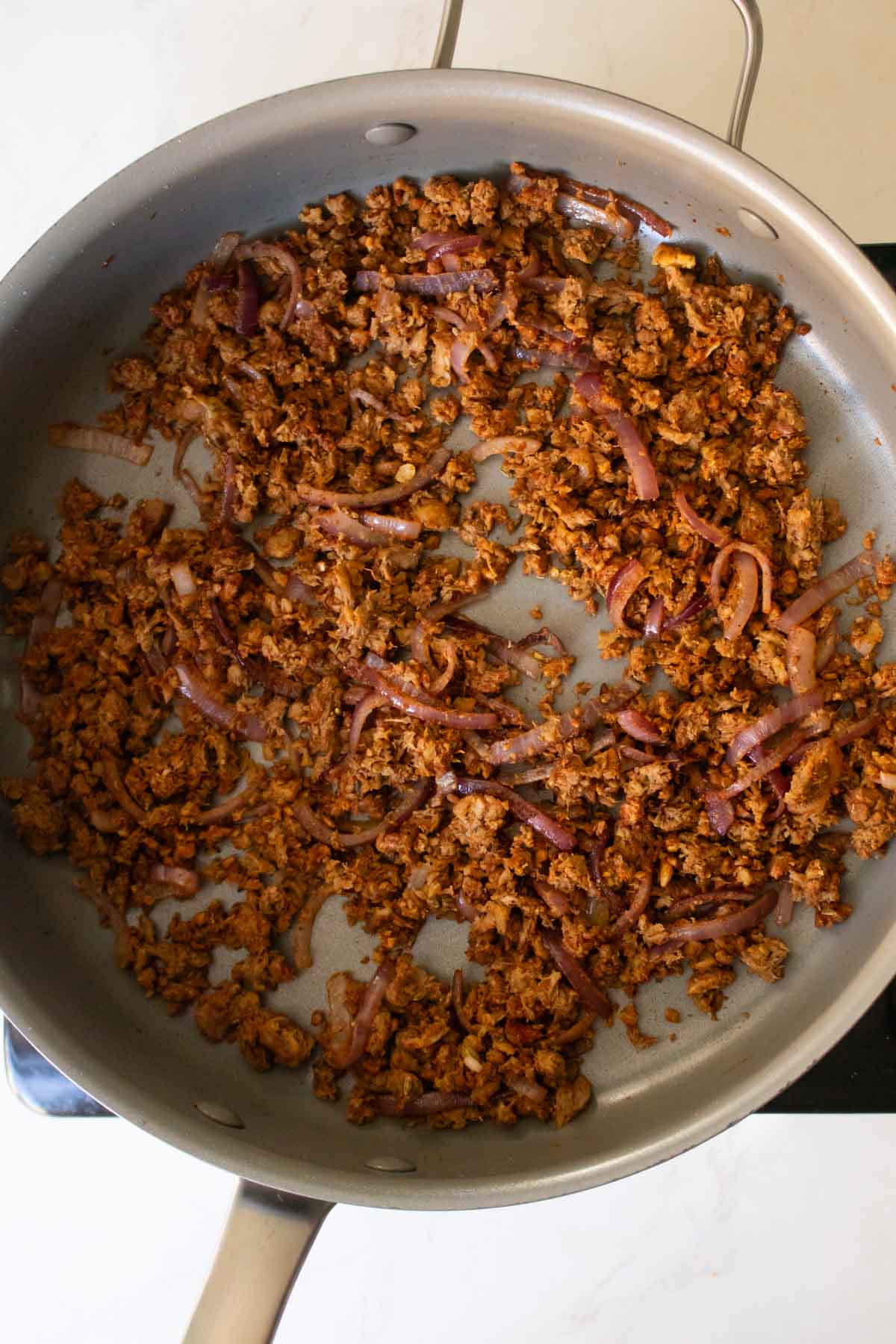 browned crumbles in the pan