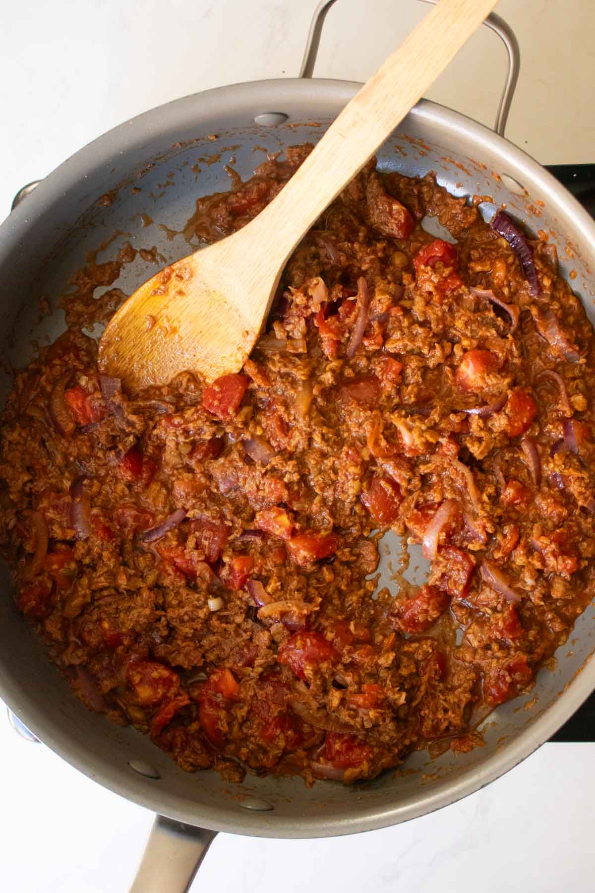 sausage-y crumbles after mixing in the tomato and soy sauce