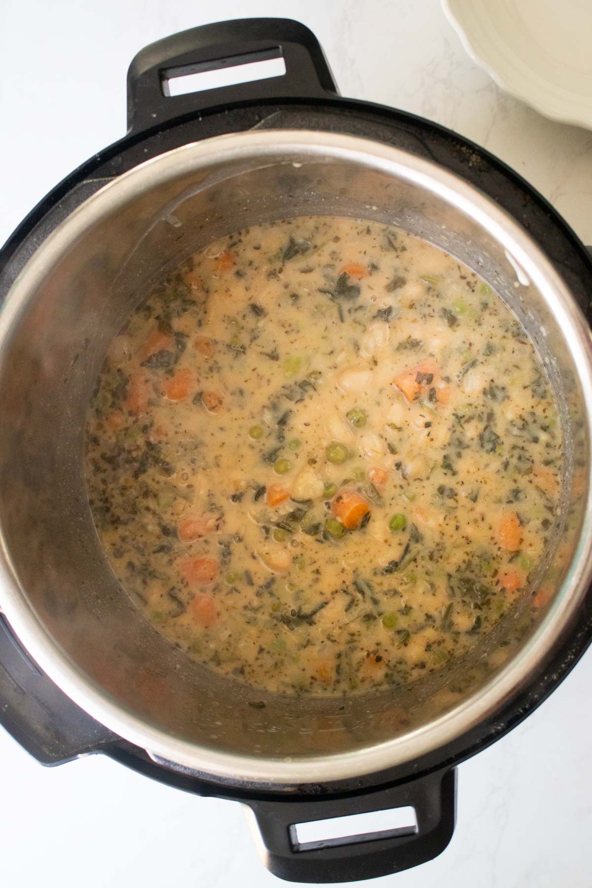 Instant Pot white bean soup after stirring in the yogurt