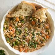 Instant Pot white bean soup with toppings and bread