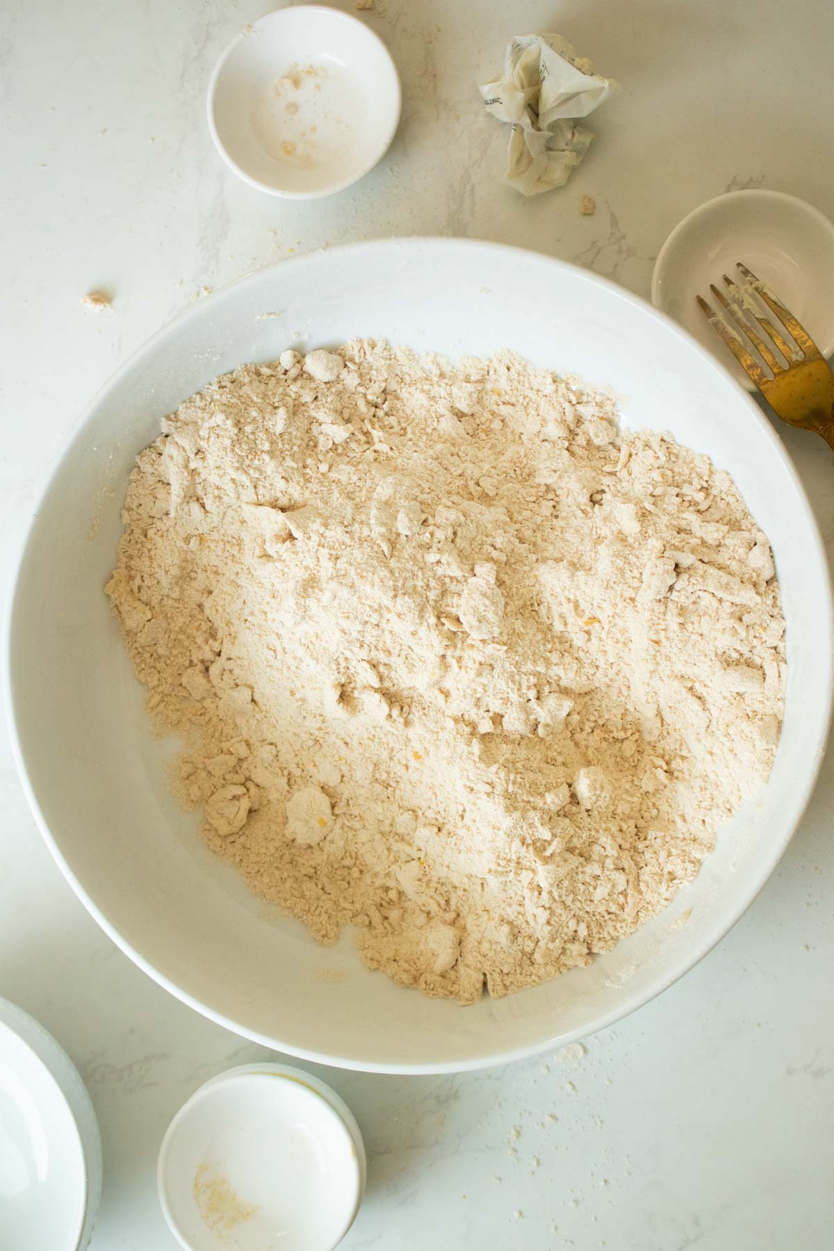 sandy mixture after mixing butter into dry ingredients