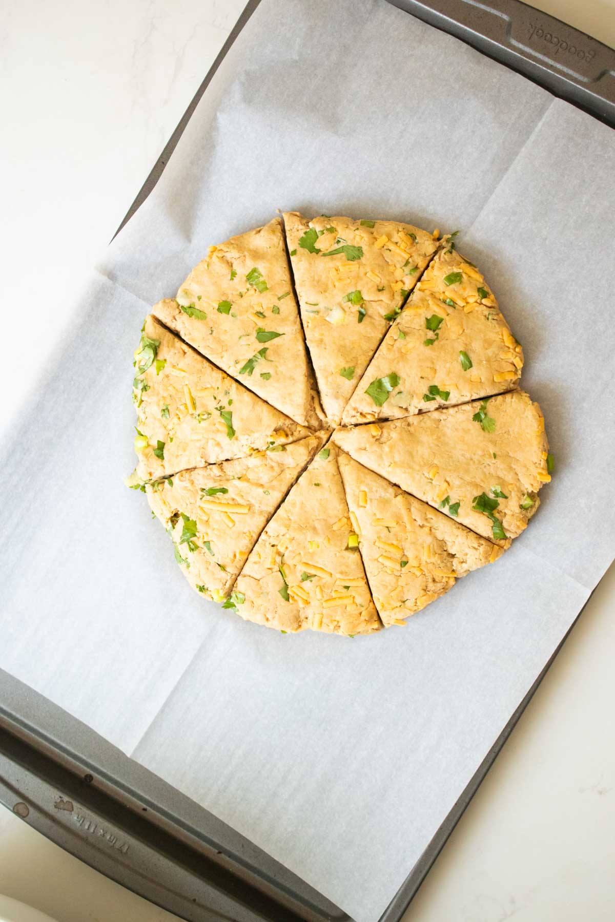 savory vegan scones dough cut into pieces