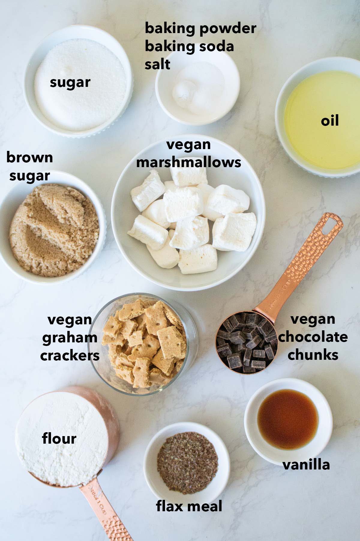 vegan s'mores cookies ingredients in cups and bowls, text overlay