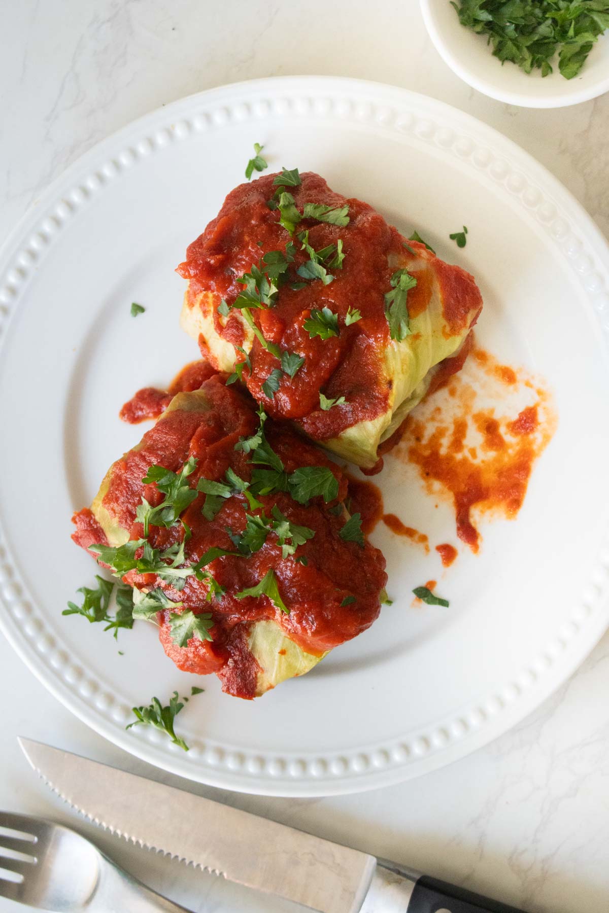 overhead shot of vegan rolled cabbage on the plate
