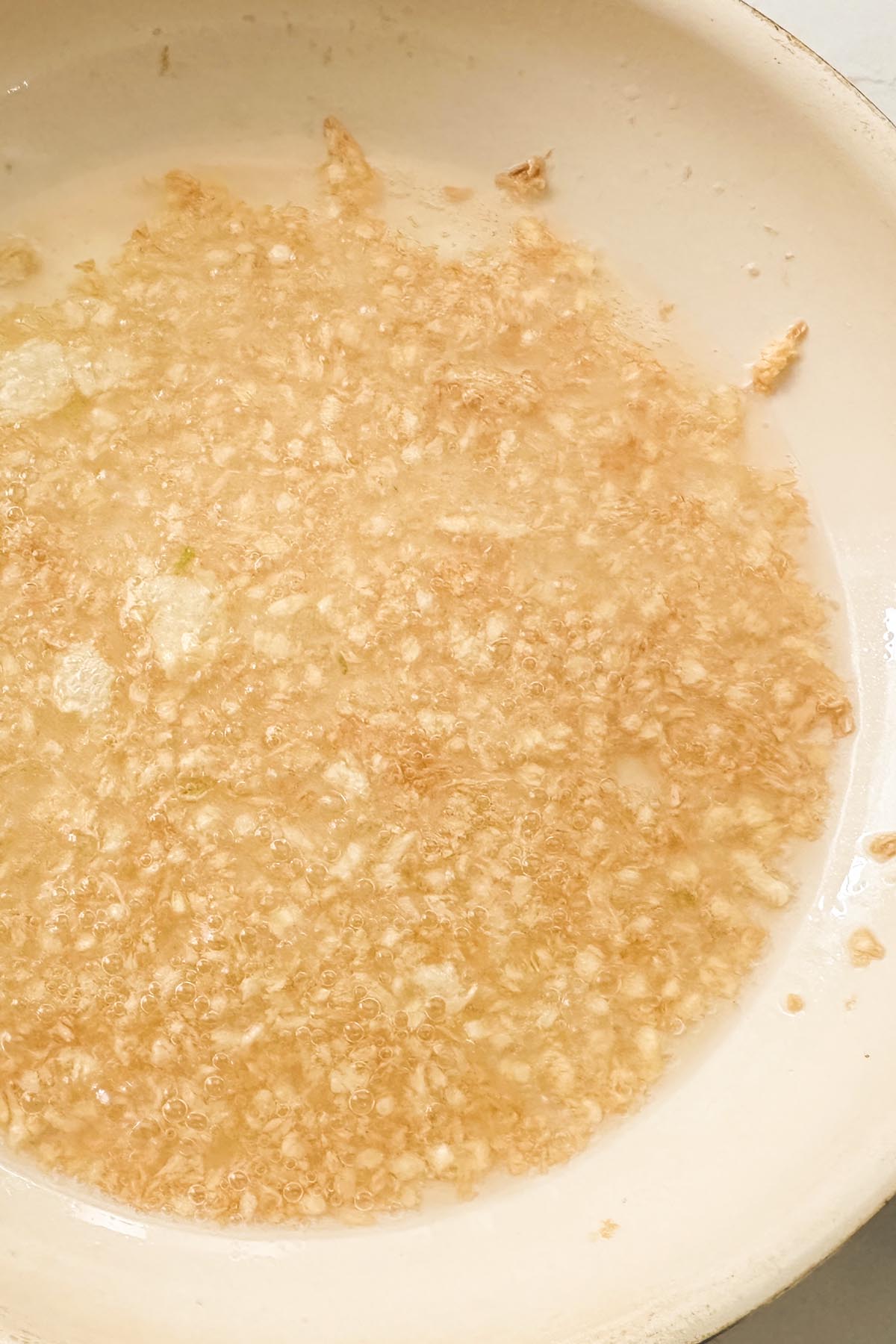 garlic in the pan after cooking