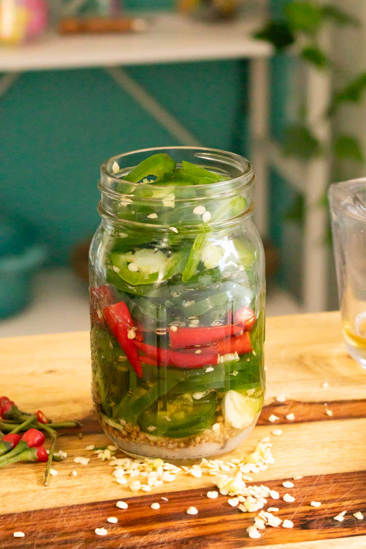 jar of chilies after adding the vinegar