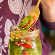 fork serving some pickled chilies from the jar