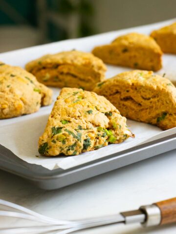 close-up of a savory vegan scone on the baking sheet after baking