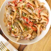 bowl of vegan Philly cheesesteak pasta