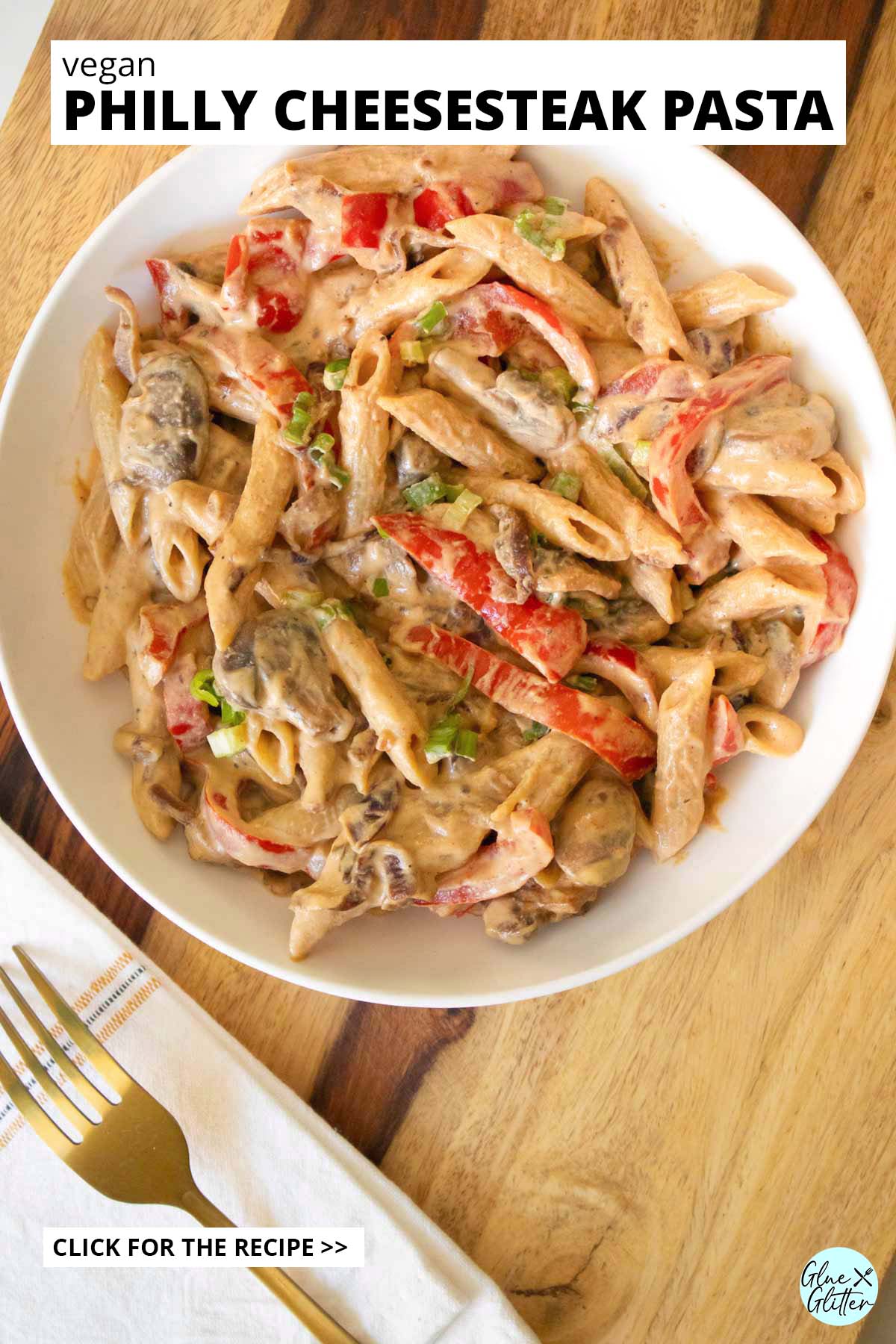 bowl of vegan Philly cheesesteak pasta, text overlay