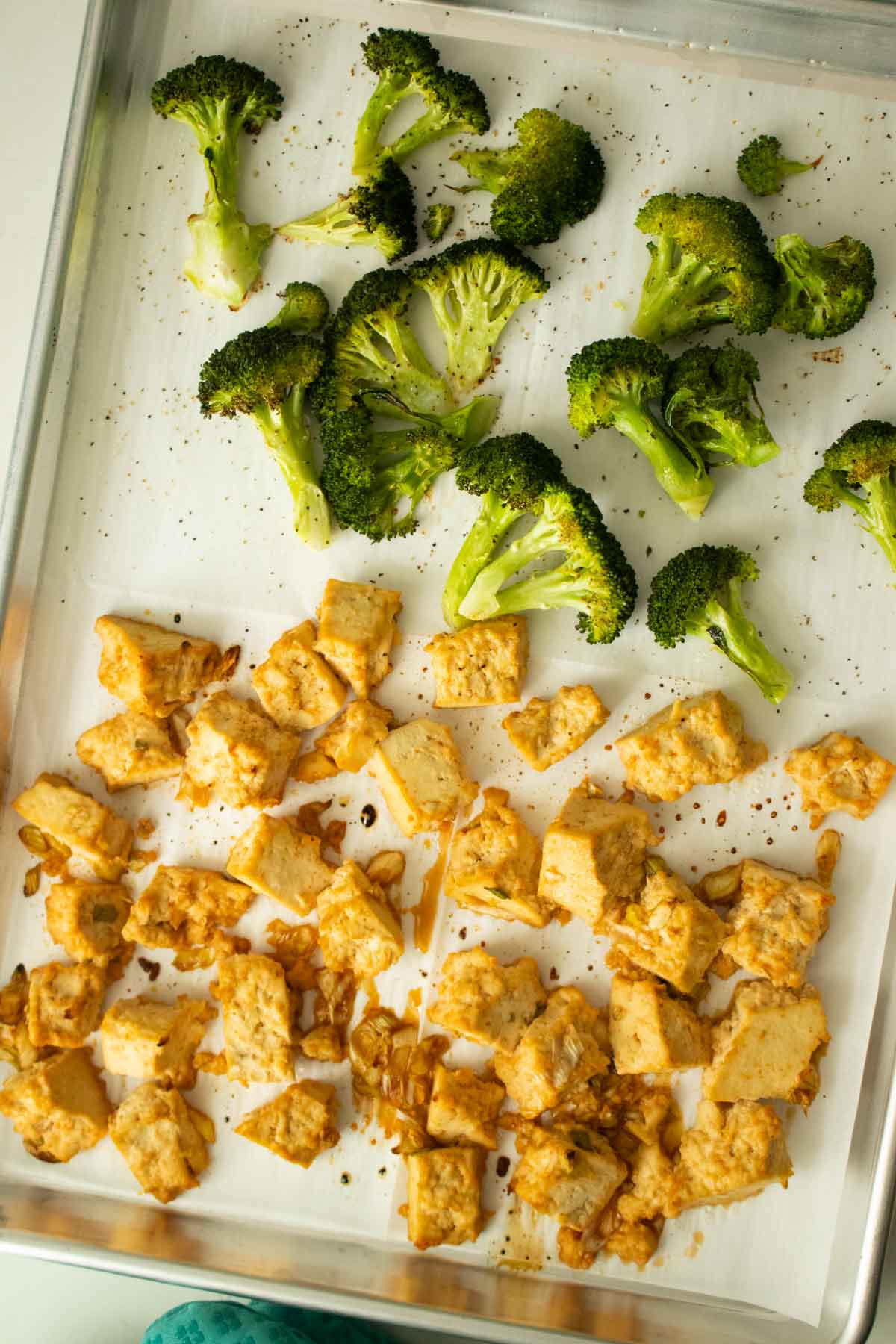 sheet pan honey garlic tofu after the first bake
