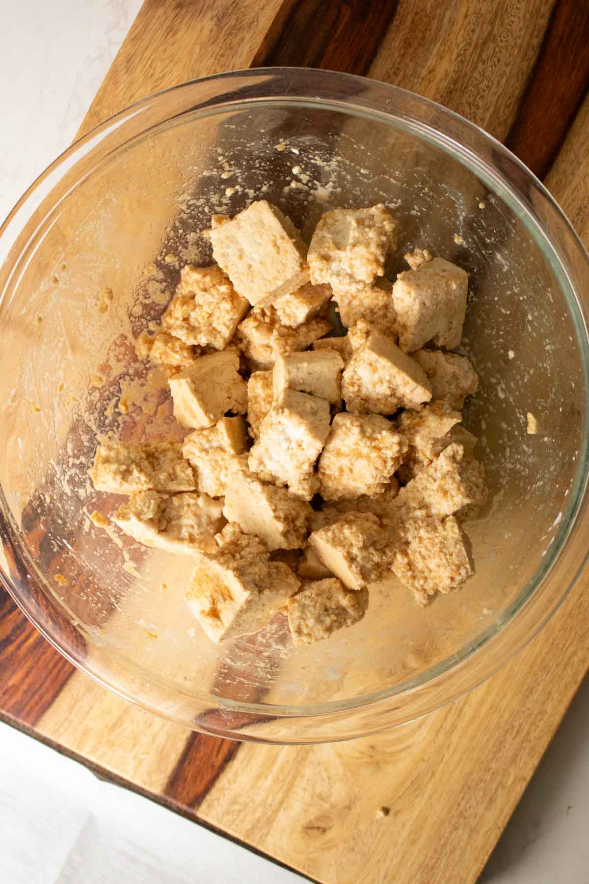 tofu after tossing with cornstarch, soy sauce, and spices