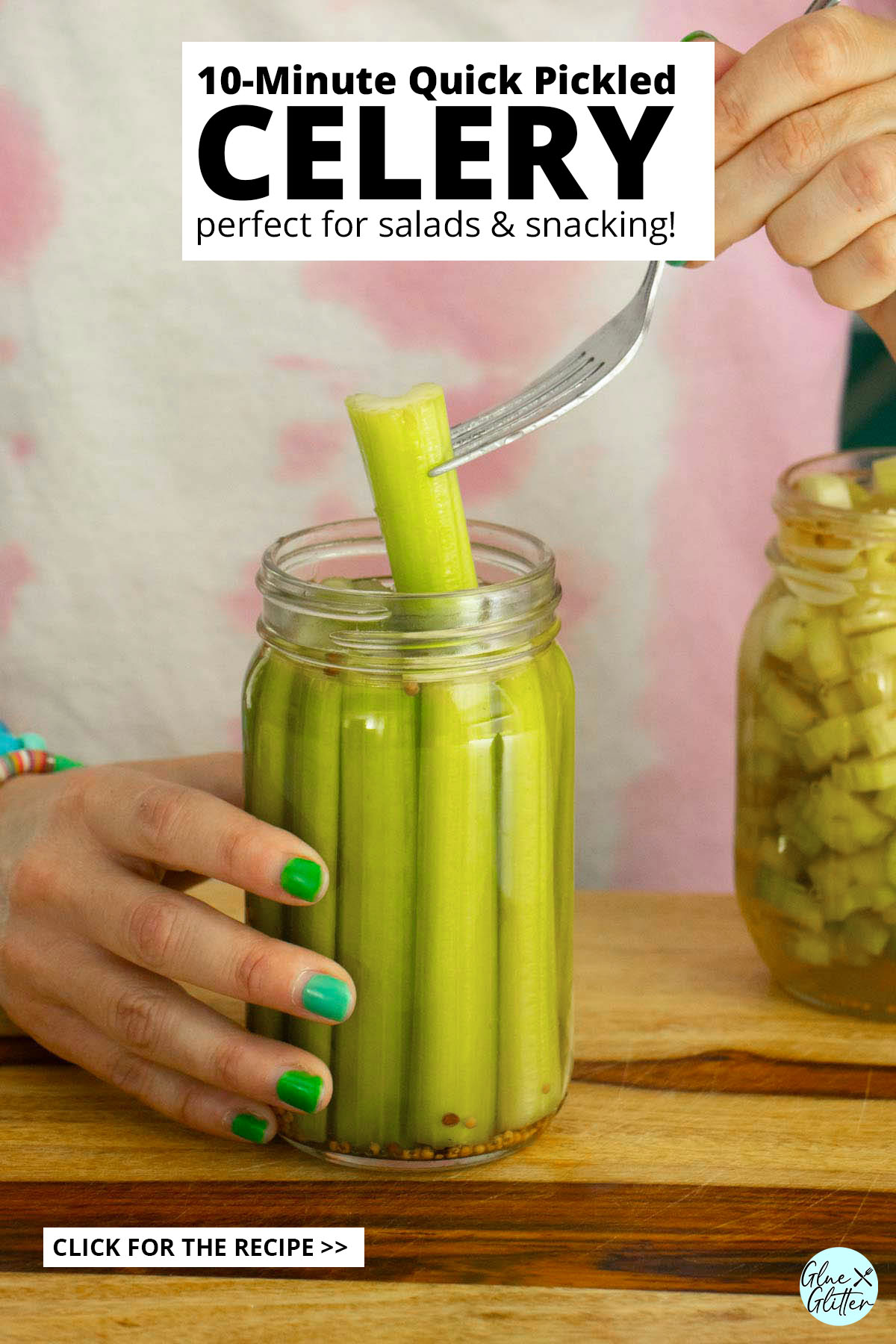 fork pulling a pickled celery spear out of a jar, text overlay