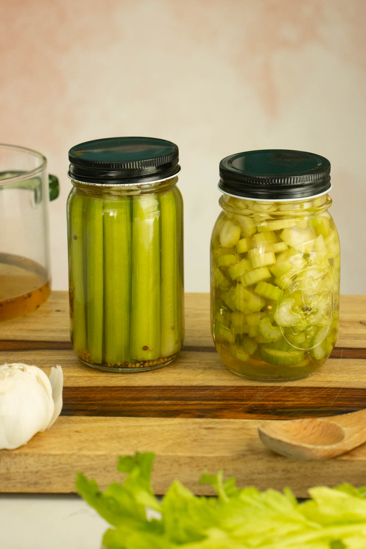 celery spears and slices in jars with the lids on